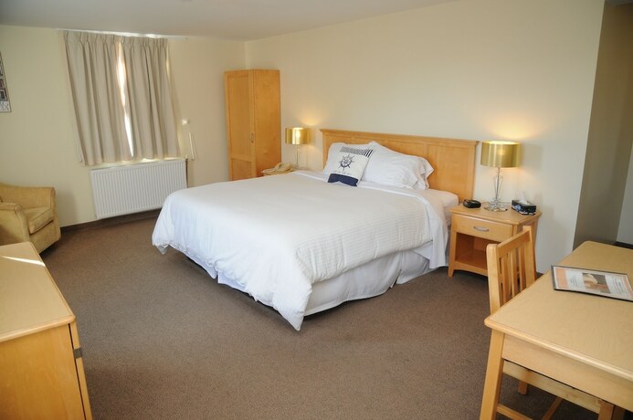 Imagen de la habitación del Hotel Smugglers Cove Inn. Foto 18