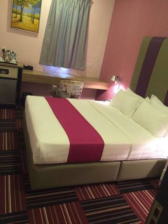 Imagen de la habitación del Hotel Smurf Inn Homestay. Foto 4