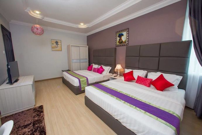 Imagen de la habitación del Hotel Smurf Inn Homestay. Foto 8