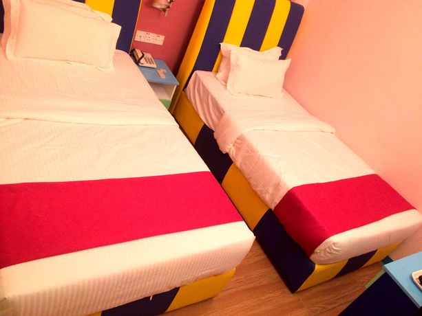 Imagen de la habitación del Hotel Smurf Inn Homestay. Foto 9