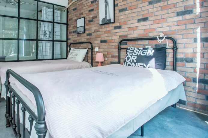 Imagen de la habitación del Hotel Snail Home Inn. Foto 18