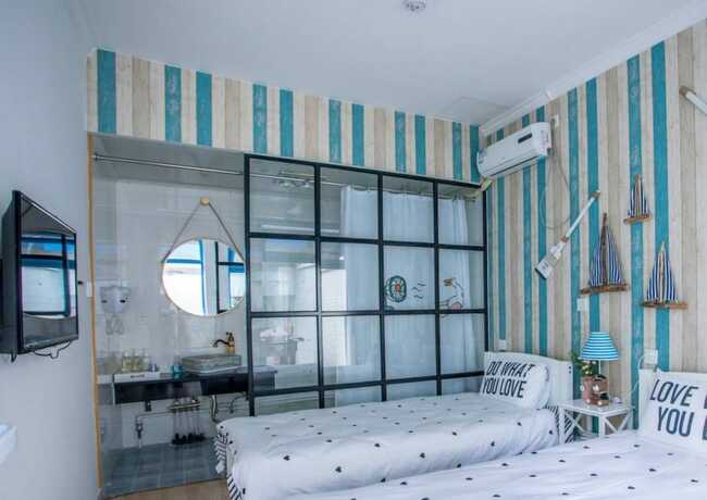 Imagen de la habitación del Hotel Snail Home Inn. Foto 20