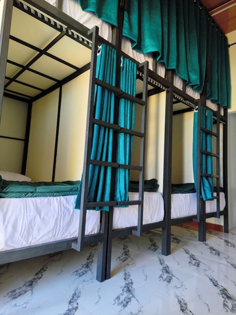 Imagen de la habitación del Hotel Snooze Hostel. Foto 7