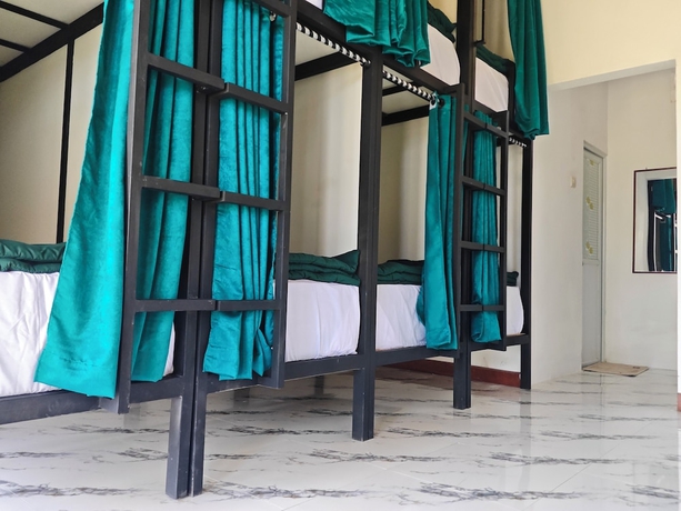 Imagen de la habitación del Hotel Snooze Hostel. Foto 12