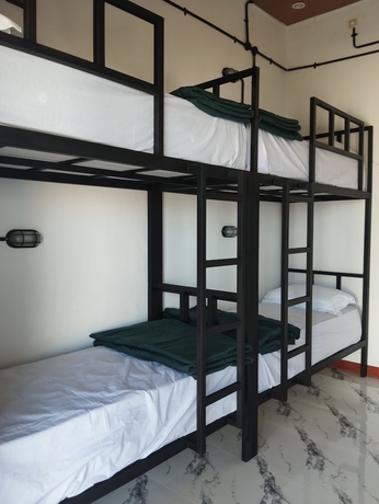 Imagen de la habitación del Hotel Snooze Hostel. Foto 14