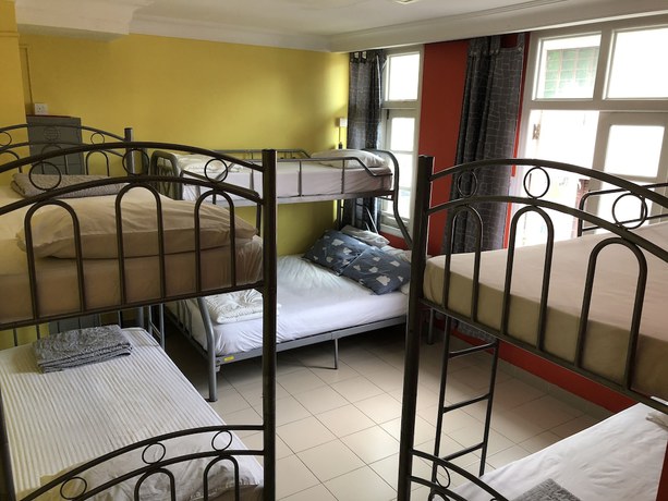 Imagen de la habitación del Hotel Snooze Inn Dickson Road. Foto 12