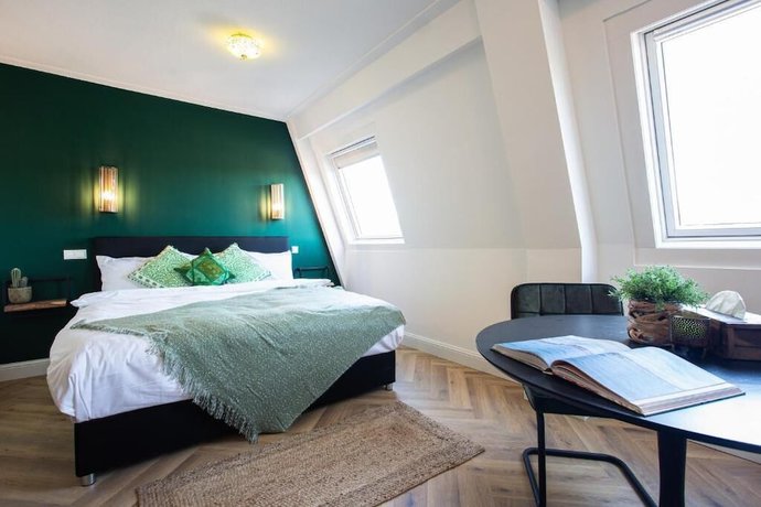 Imagen de la habitación del Hotel Snouck van Loosen. Foto 15