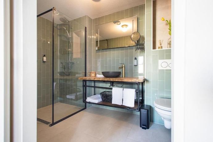 Imagen de la habitación del Hotel Snouck van Loosen. Foto 17