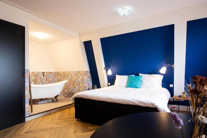 Imagen de la habitación del Hotel Snouck van Loosen. Foto 19