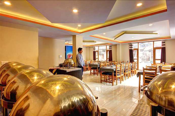 Imagen del bar/restaurante del Hotel Snow Country Manali. Foto 2