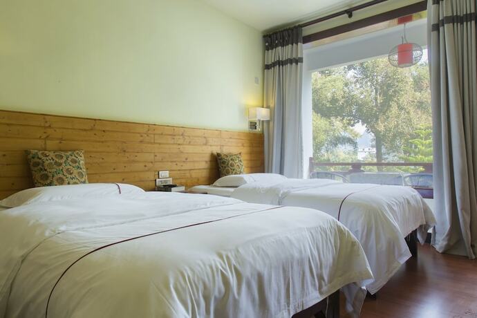 Imagen general del Hotel Snow Lion Riverside Resort. Foto 9