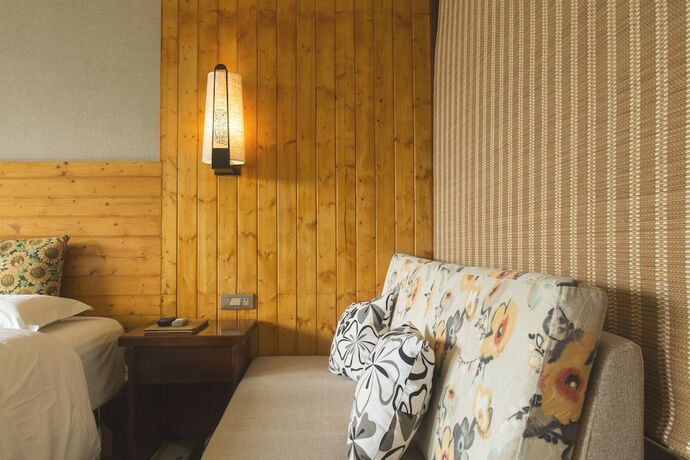 Imagen de la habitación del Hotel Snow Lion Riverside Resort. Foto 11