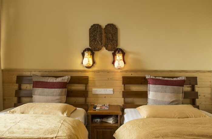 Imagen de la habitación del Hotel Snow Lion Riverside Resort. Foto 16