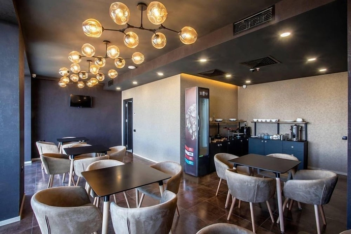Imagen del bar/restaurante del Hotel Snow Rooms. Foto 3