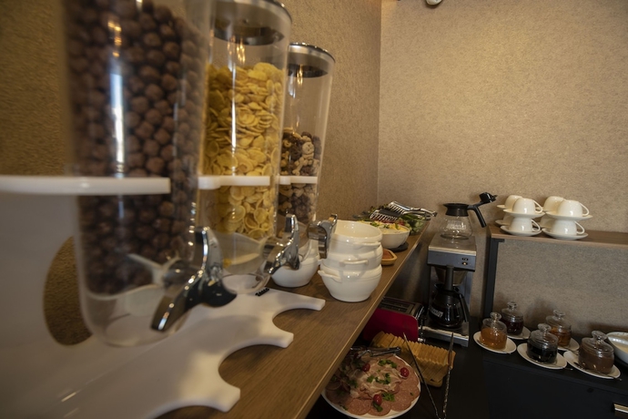 Imagen del bar/restaurante del Hotel Snow Rooms. Foto 6