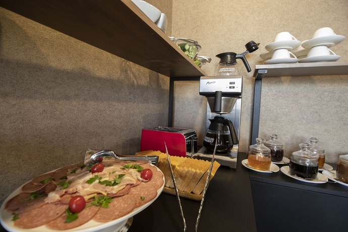 Imagen del bar/restaurante del Hotel Snow Rooms. Foto 7