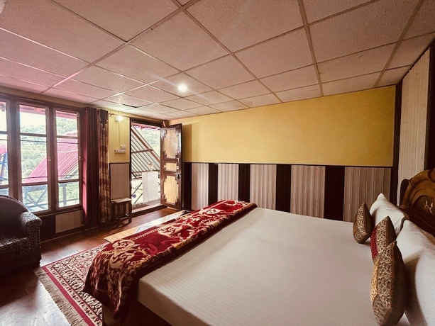 Imagen de la habitación del Hotel Snow View Chopta. Foto 1