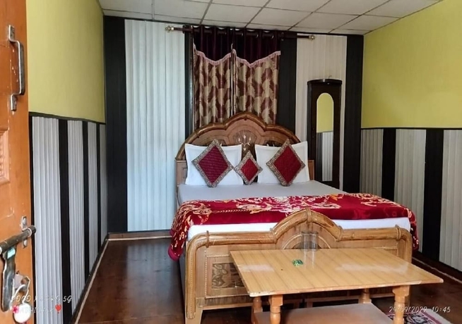 Imagen de la habitación del Hotel Snow View Chopta. Foto 3
