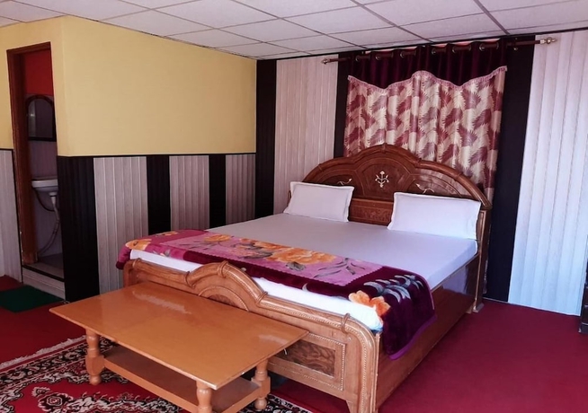 Imagen de la habitación del Hotel Snow View Chopta. Foto 6