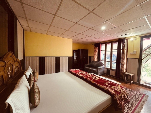 Imagen de la habitación del Hotel Snow View Chopta. Foto 8