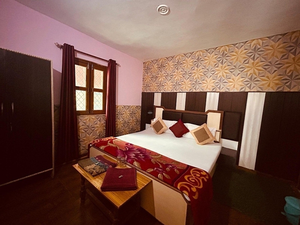 Imagen de la habitación del Hotel Snow View Chopta. Foto 12