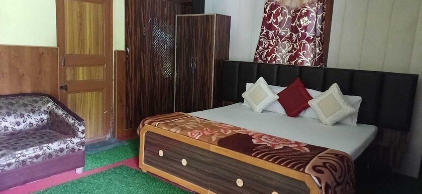 Imagen de la habitación del Hotel Snow View Chopta. Foto 13