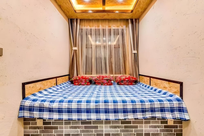 Imagen de la habitación del Hotel Snow house, Harbin. Foto 11