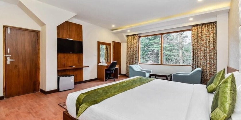 Imagen de la habitación del Hotel Snowcrests Manor, Manali. Foto 6