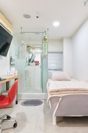 Imagen de la habitación del Hotel Snowflower Guesthouse. Foto 14