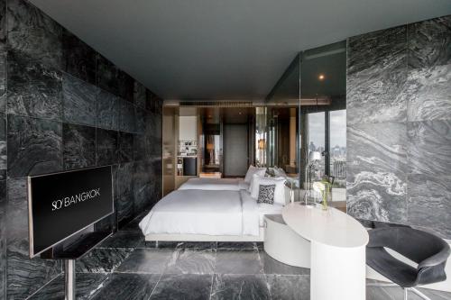 Imagen de la habitación del Hotel So/ Bangkok. Foto 11