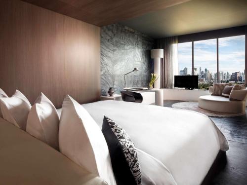 Imagen de la habitación del Hotel So/ Bangkok. Foto 15