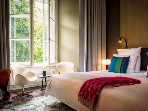 Imagen de la habitación del Hotel So/ Berlin Das Stue. Foto 18