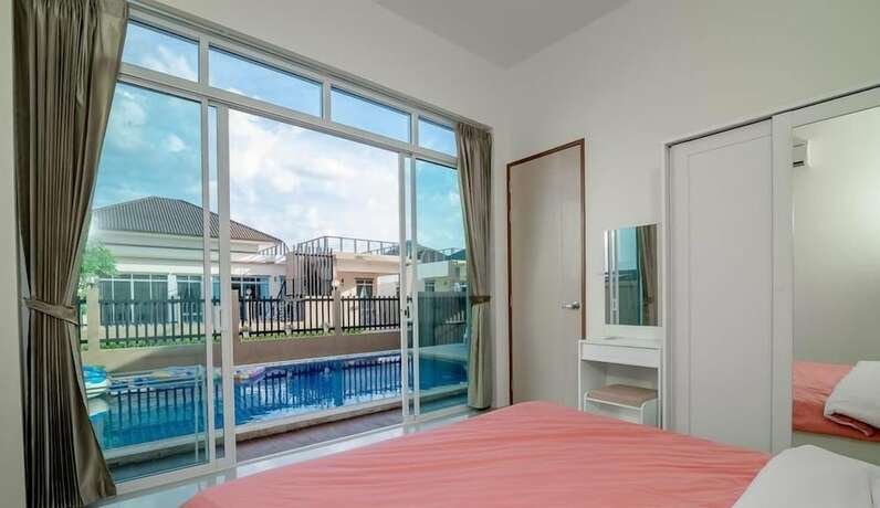 Imagen de la habitación del Hotel So Cool Pool Villa. Foto 21