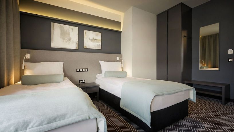 Imagen de la habitación del Hotel So Stay. Foto 7