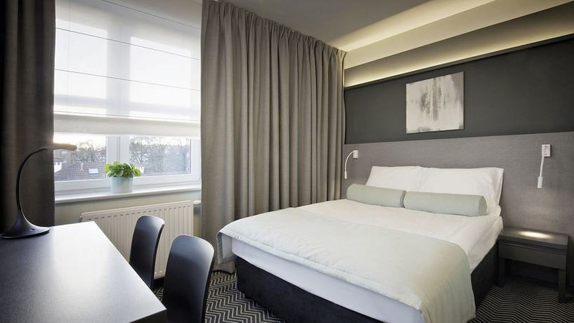 Imagen de la habitación del Hotel So Stay. Foto 16