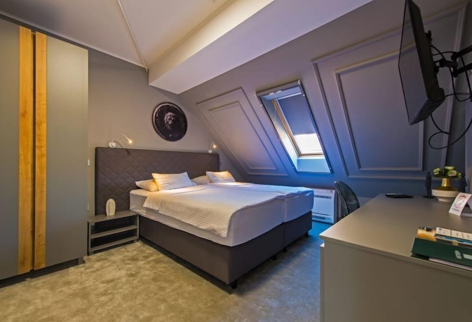 Imagen de la habitación del Hotel Sobe Merlon, Osijek. Foto 10