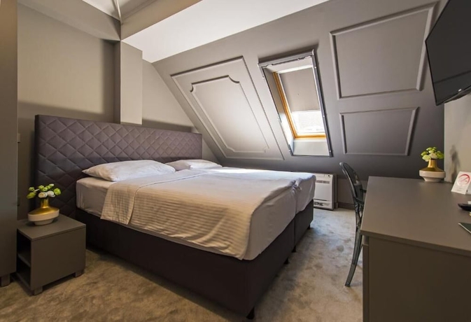 Imagen de la habitación del Hotel Sobe Merlon, Osijek. Foto 10