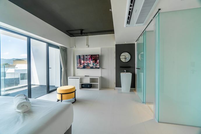Imagen de la habitación del Hotel Socialtel Koh Samui. Foto 14