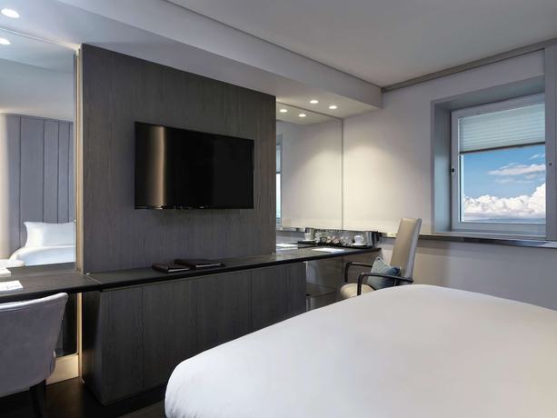 Imagen de la habitación del Hotel Sofitel Athens Airport. Foto 10