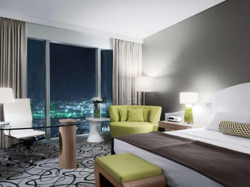 Imagen de la habitación del Hotel Sofitel Dubai Downtown. Foto 14