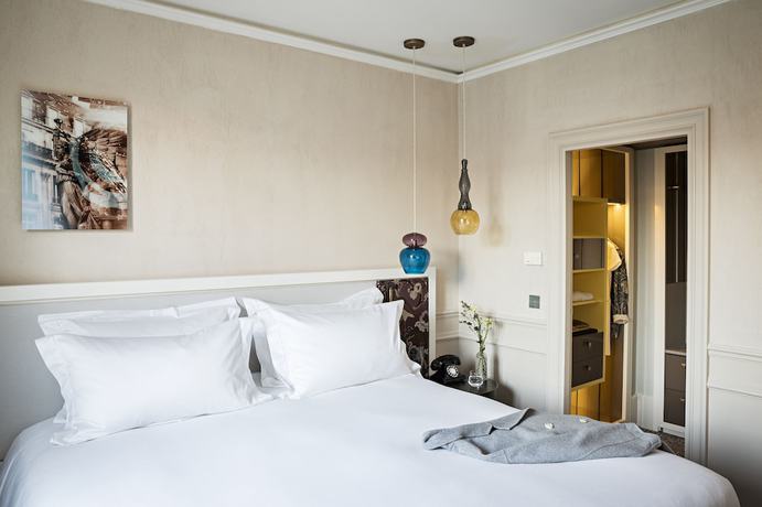 Imagen de la habitación del Hotel Sofitel Le Scribe Paris Opéra. Foto 12