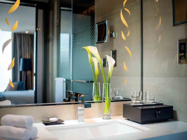 Imagen de la habitación del Hotel Sofitel Lianyungang Suning. Foto 15