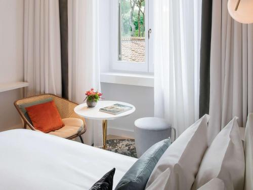 Imagen de la habitación del Hotel Sofitel Rome Villa Borghese. Foto 16