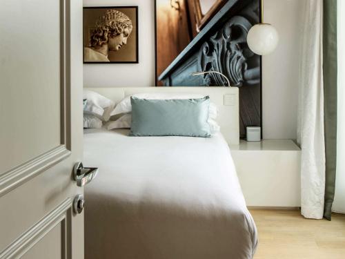 Imagen de la habitación del Hotel Sofitel Rome Villa Borghese. Foto 17