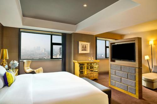Imagen de la habitación del Hotel Sofitel Zhengzhou International. Foto 4