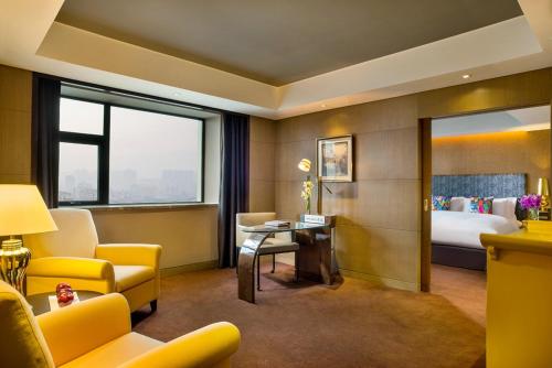 Imagen de la habitación del Hotel Sofitel Zhengzhou International. Foto 5
