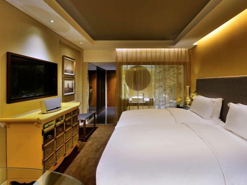 Imagen de la habitación del Hotel Sofitel Zhengzhou International. Foto 6