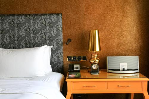 Imagen de la habitación del Hotel Sofitel Zhengzhou International. Foto 9