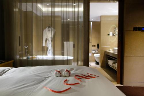 Imagen de la habitación del Hotel Sofitel Zhengzhou International. Foto 10