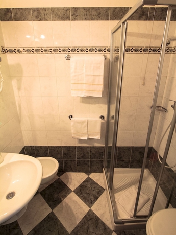 Imagen de la habitación del Hotel Soggiorno Athena. Foto 16